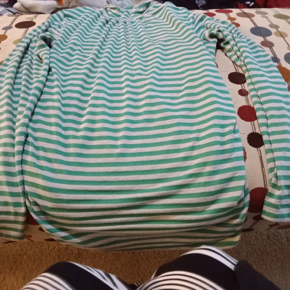 It is a maternity top made by mini maternity